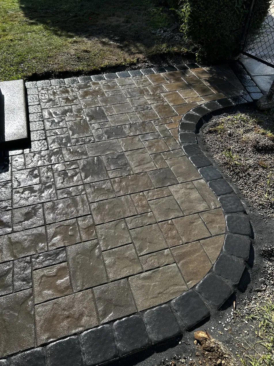 Finished curved stone paver patio